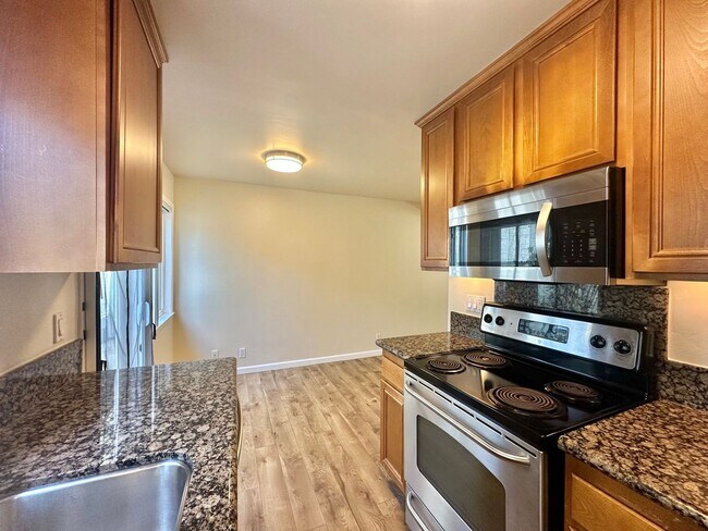 Building Photo - Beautifully Renovated Multi-Level Living C...