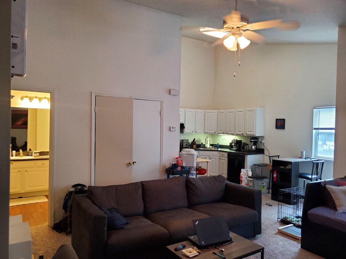 Living Room w/ Kitchen in Background - 110 Rosedown Dr