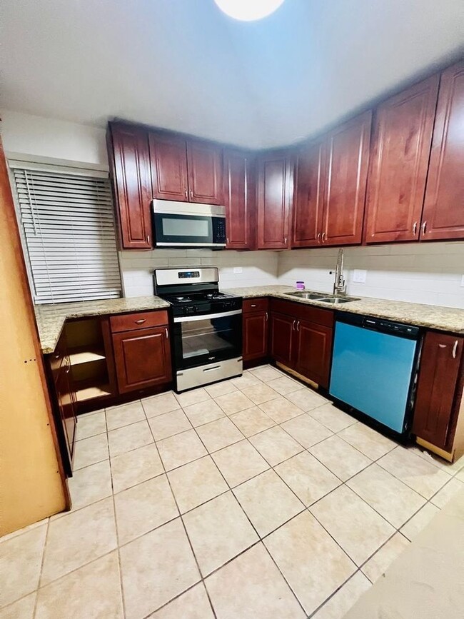 Foto del edificio - 7433 S Perry Ave