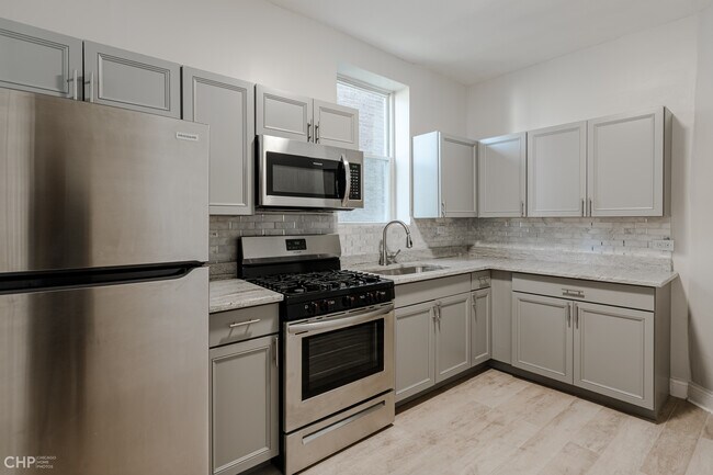 Building Photo - 6032 S St Lawrence Ave