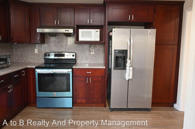 Building Photo - 4 br, 2 bath House - 609 Blom Drive
