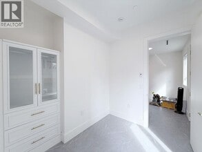 Building Photo - 10XX E 62nd Ave