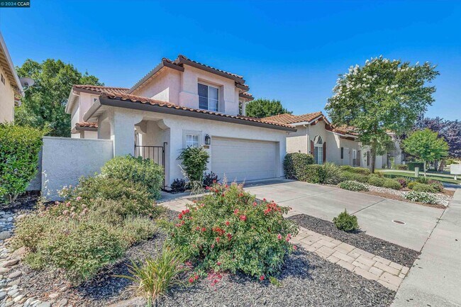 Building Photo - Updated Mediterranean-style home in Renais...