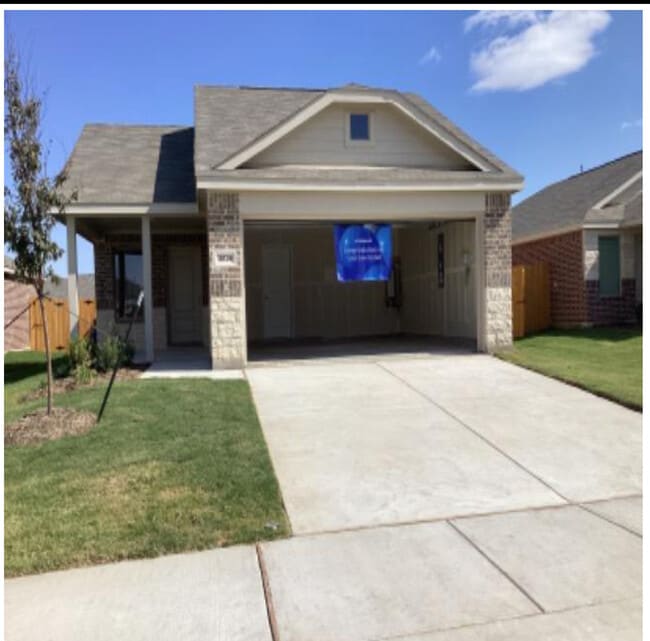 front view- 2 car garage - 15136 Tejano St