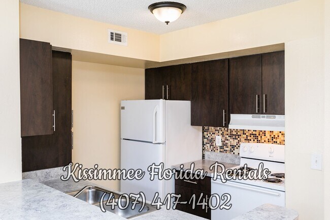 Foto del edificio - Beautiful Condo with 2-bedroom and 2-bathroom in the heart of Kissimmee