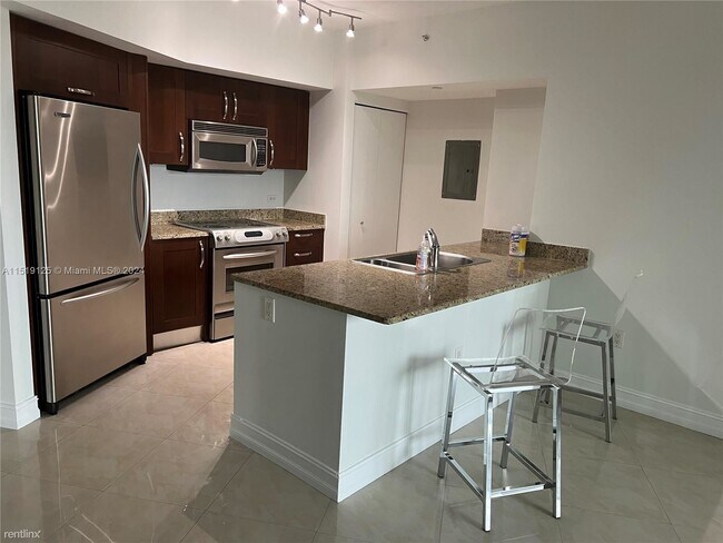 Foto del edificio - 1 br, 1 bath Condo - 19900 E Country Club ...