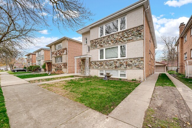 Foto del edificio - 5740 N Lowell Ave