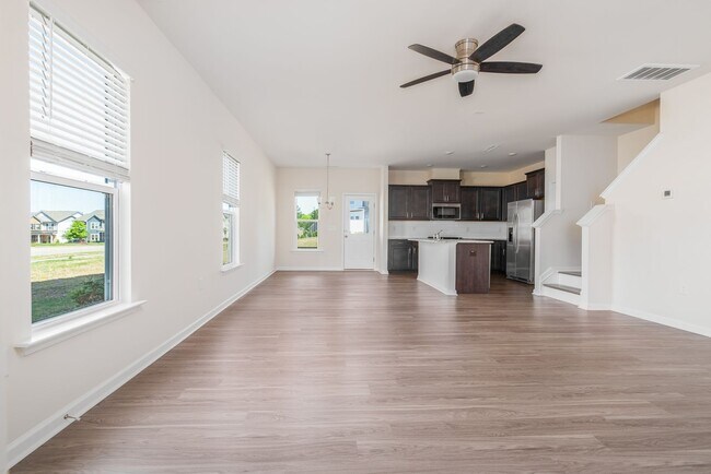 Building Photo - End unit townhome loaded with upgrades close to RTP! Available: Now