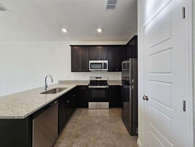 Foto del edificio - 9204 Prickly Ash Dr