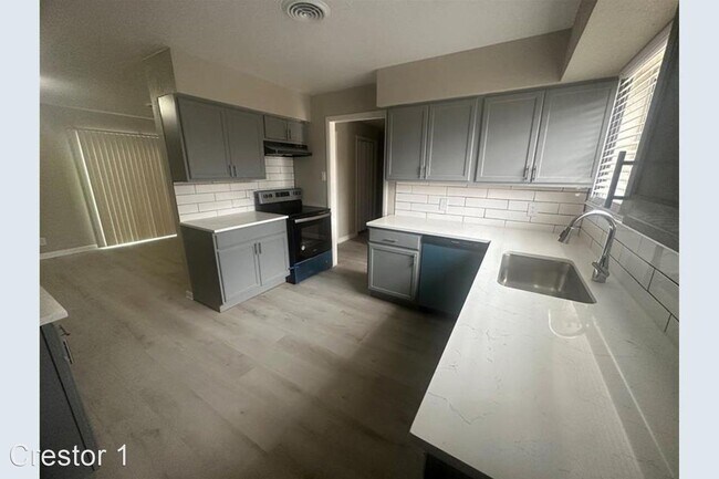 Foto del edificio - 3 br, 1 bath House - 407 E. Lilly Lane
