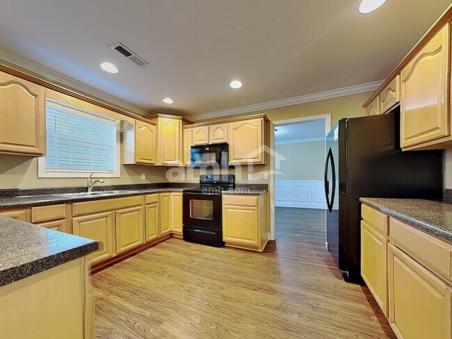 Foto del edificio - 6317 Stillglen Ln