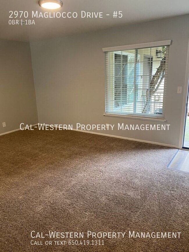 Building Photo - Charming downstairs studio apartment- read...