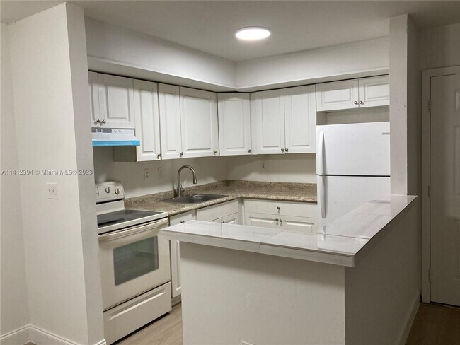 Building Photo - 18965 NW 62nd Ave