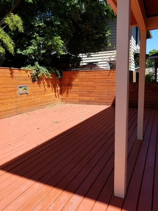 The very large deck is an attractive and functional outdoor living space. - 2123 SE Ankeny St