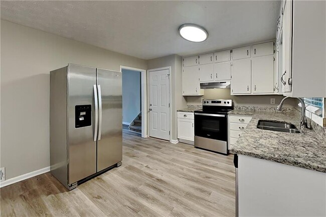 Foto del edificio - 5104 Dogwood Hills Dr