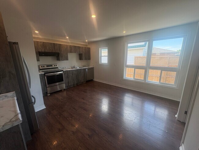 Photo du bâtiment - 3 Bedroom Unit