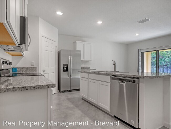 Building Photo - 4 br, 2 bath House - 7559 Tourmaline Drive