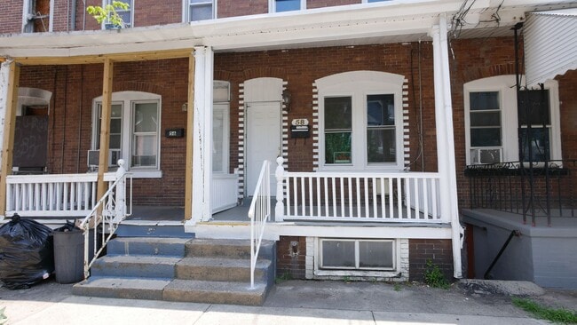 Building Photo - Completely Renovated Interior Row House 4B...