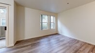This 1-bedroom, 1-bathroom unit at 2505 5th St, Unit 116 in Davis, CA offers a thoughtfully laid-out single-floor plan with a clean, neutral aesthetic throughout. The combined living and dining area is bright and welcoming, featuring light wood-look flooring, soft neutral walls, and two windows that frame views of the surrounding greenery, filling the space with natural light. A sliding glass door opens directly to a private patio, seamlessly connecting indoor and outdoor living. A ceiling fan adds comfort to the adjacent area.

The kitchen is well-appointed with white shaker-style cabinetry, ample counter space, a stainless steel sink, and a skylight overhead that enhances the sense of openness. Matching appliances, including a dishwasher and range, complete the functional layout.

The bedroom offers comfortable proportions, plush carpeting, a ceiling fan with light fixture, and two windows that allow natural light to brighten the room. Two closets provide generous storage throughout the unit.

The bathroom is finished with wood-look flooring, a white vanity with cabinet storage, and a full soaking tub with shower. An in-unit laundry area adds everyday convenience. A hallway connects the rooms, creating a cohesive and practical flow throughout the entire space.