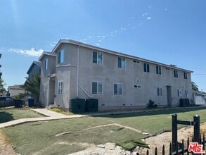 Building Photo - 10217 S Grand Ave