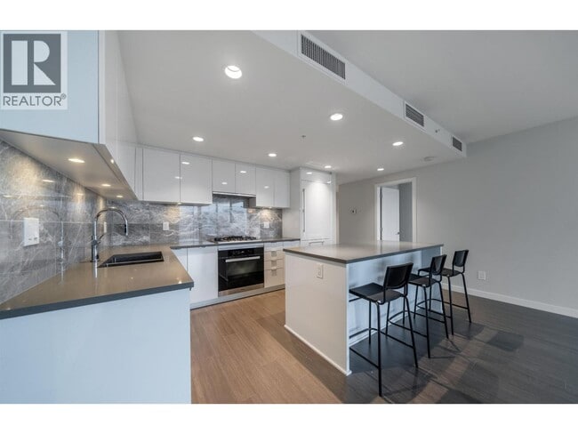 Photo du bâtiment - 3699 Sexsmith Rd