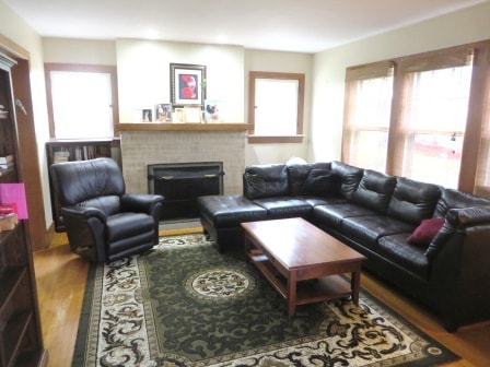 Living room looking west with fireplace - 100 Oak Knoll Dr