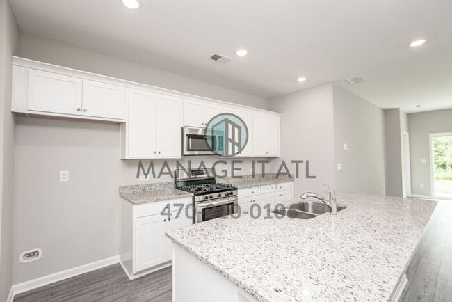 Foto del edificio - Beautiful 5 Bedroom House with a Master Be...