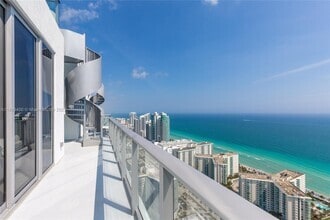 Building Photo - 4010 S Ocean Dr