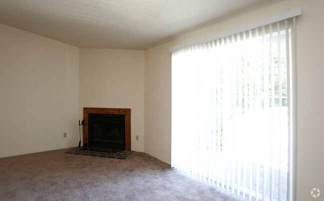 Living Room with Vaulted Ceilings and Fireplace (3rd Floor Apartment) - Lee's Crossing