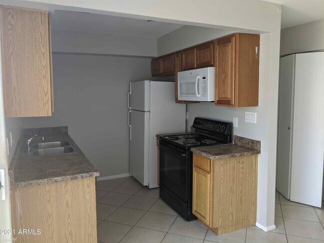 Foto del edificio - 2 br, 2 bath Condo - 3840 N 43rd Ave Apt 7...
