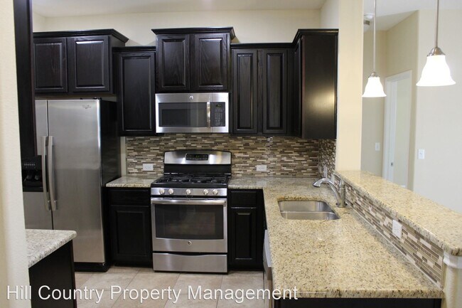 Building Photo - 4 br, 2 bath House - 409 Tula Trail
