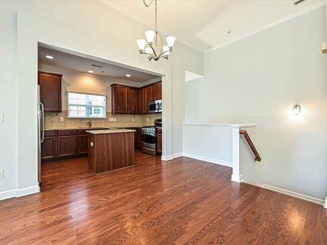 Foto del edificio - Stylish Condo Living with Open Concept, Garage & Outdoor Space