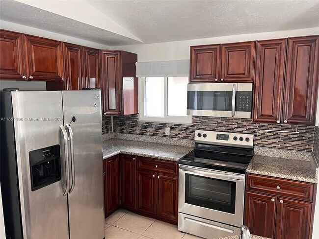 Building Photo - 8871 SW 24th Pl