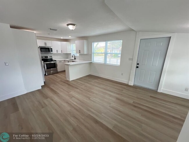 Building Photo - 10540 NW 28th Ave
