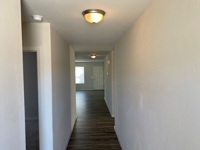 Building Photo - 4 bedroom with garage and fenced yard