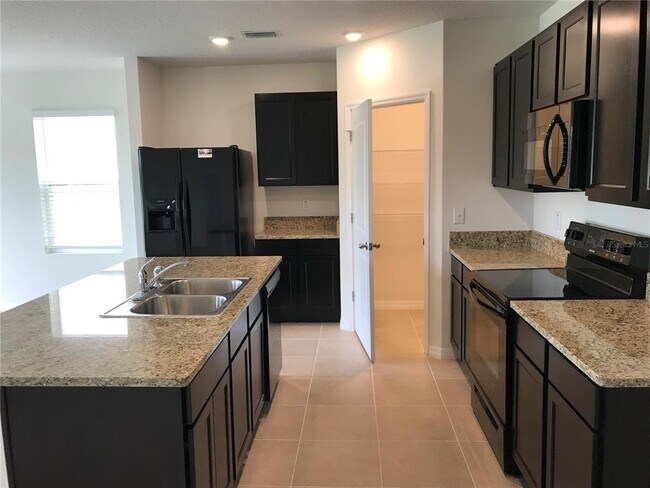 Building Photo - 6993 Silverado Ranch Blvd