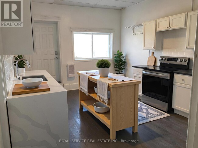 Photo du bâtiment - 36 King St W