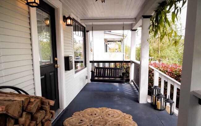 Thumbnail image Enjoy your morning coffee on our roofed front porch. - 5233 NE 18th Ave