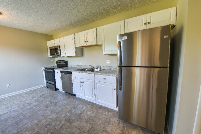 Foto del edificio - 7117 Tollhouse Dr