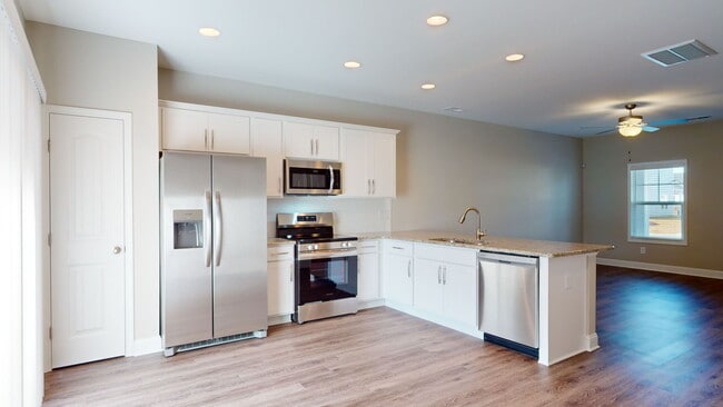 Building Photo - 11@Main Townhomes