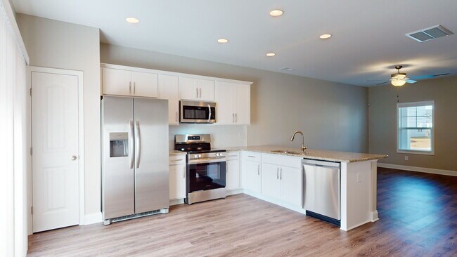 Foto del edificio - 11@Main Townhomes