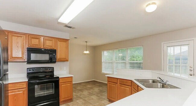 Building Photo - 7501 Fossil Garden Dr