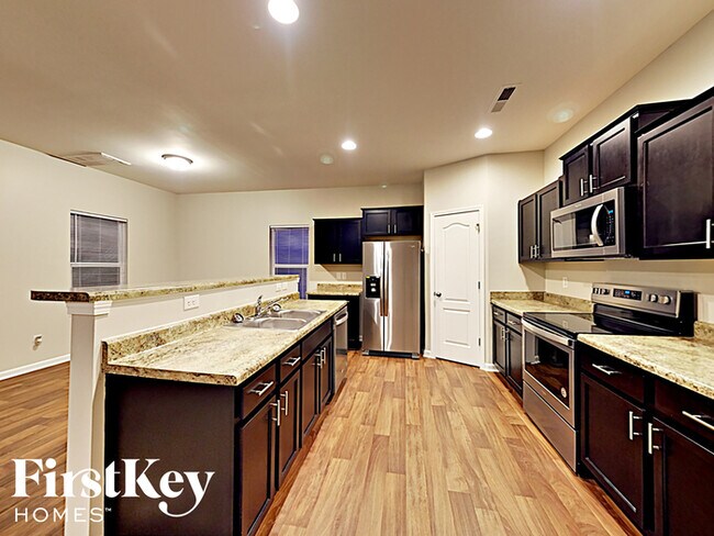 Building Photo - 6402 Springbeauty Dr