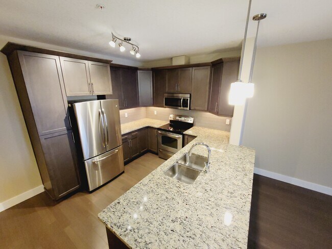 Photo du bâtiment - 6079 Maynard Way NW