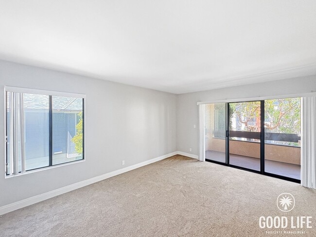 Building Photo - Light-Filled 2BD/2BA Top-Floor Condo in Mira Mesa with Granite Kitchen, Private Balcony & Pool