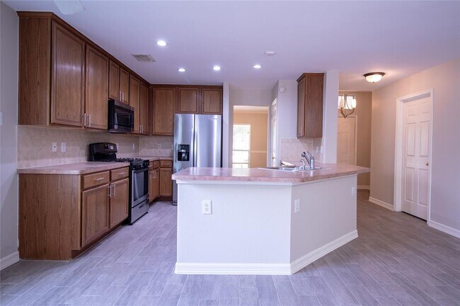Foto del edificio - 14814 Mills Park Ln