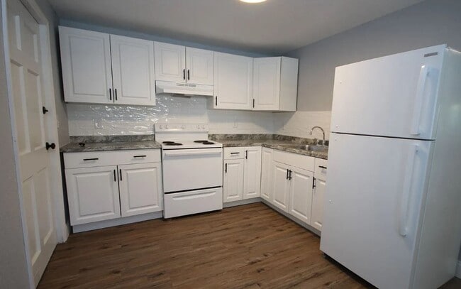Building Photo - Coming November - Modern, Spacious, & Pet-...