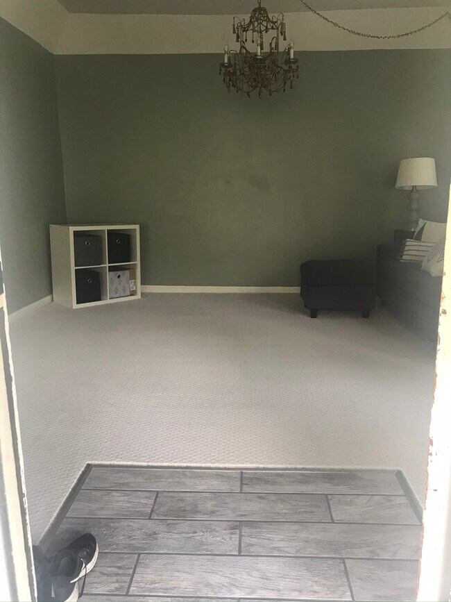 Tile landing for side entrance - 325 S Main St