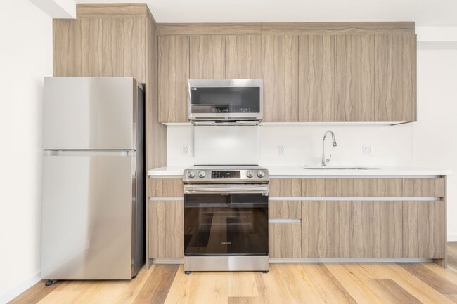 Building Photo - Brand New-Pet Friendly, Large Studio in Lu...