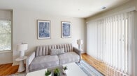 Located at 623 Harbortown Blvd in Perth Amboy, NJ, this two-story home offers a thoughtfully designed layout spread across two floors. Warm hardwood flooring flows throughout, creating a cohesive and inviting atmosphere. The main level features a bright living room with large windows that flood the space with natural light, alongside a dedicated dining room ideal for gatherings. The galley-style kitchen is well-equipped with rich honey-toned cabinetry, granite countertops, a subway tile backsplash, stainless steel appliances, and direct access to a pantry or laundry area. A convenient half bathroom and a flexible den round out the lower level. Upstairs, the spacious primary bedroom offers a comfortable retreat with generous proportions and ample closet space. The second bedroom is versatile and bright, with natural light streaming through its windows. Three full bathrooms are finished with granite vanities and tile flooring, with one featuring a glass-enclosed tub-shower combination with marble-style tile surround. A private balcony provides outdoor space, while multiple closets throughout ensure abundant storage. With seven closets, three staircases, and three hallways, this home balances practicality with comfortable, modern living.